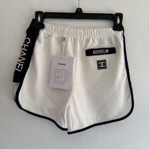 CHANEL White Athletic Shorts with Black Piping and Logo Patches
